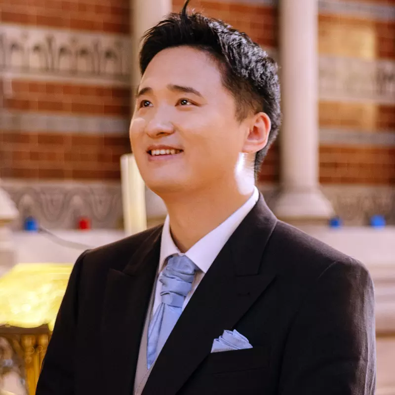 Yujiang Wang